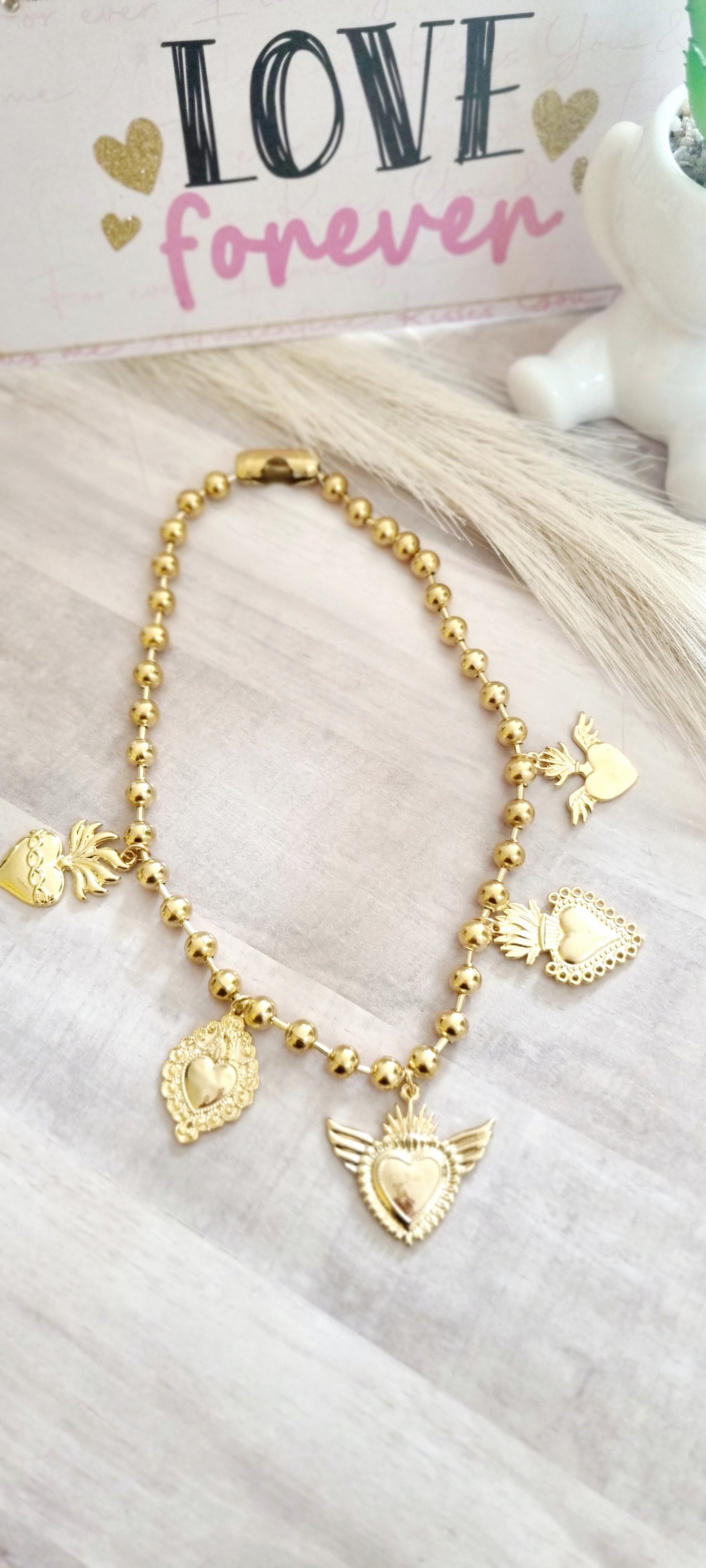 Collar corazones dorado