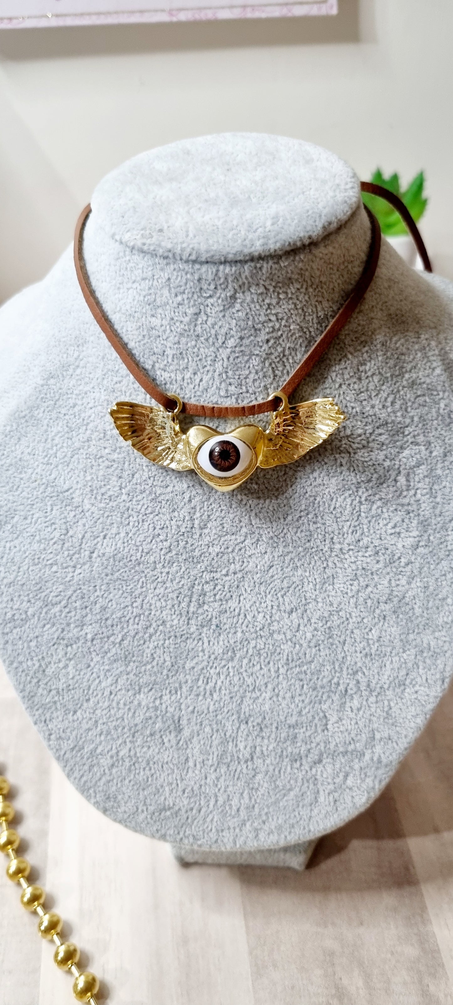 Choker ojo con alas